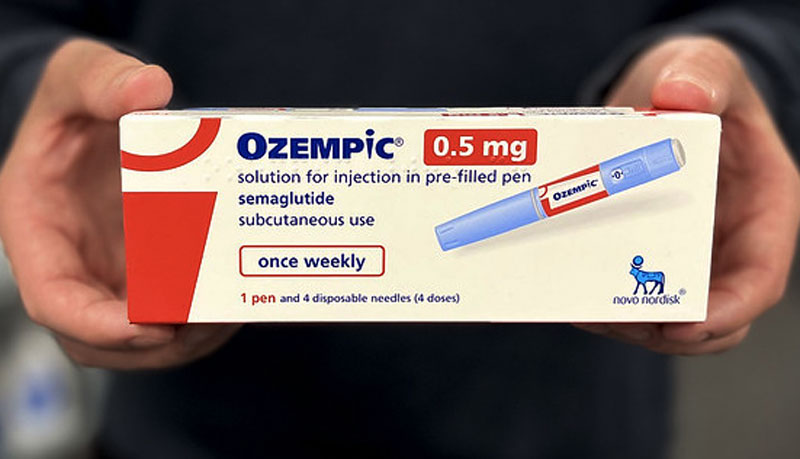 Man holding ozempic