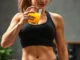 woman bodybuilder drinking natural cortisol blocker juice